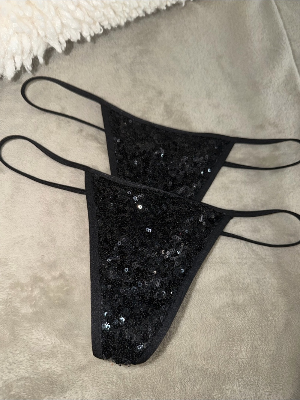 Victoria’s Secret set of black sequin g strings